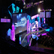The angled stage glows with color and video imagery.